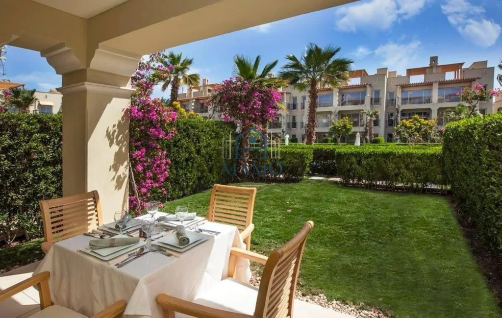 Terrace view of swimming pool and gardens in Sahl Hasheesh