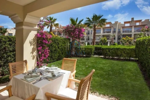 Terrace view of swimming pool and gardens in Sahl Hasheesh